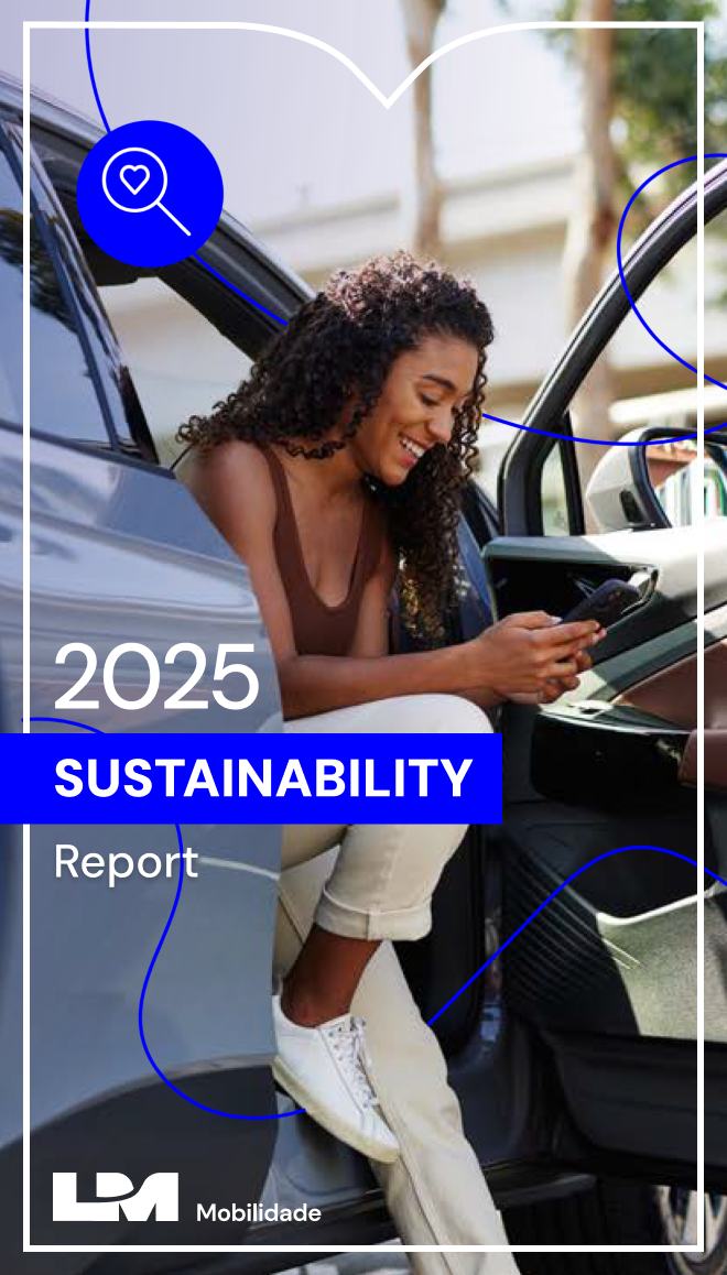 In a parked light-blue electric car, a young Black woman with long, curly hair is sitting in the front passenger seat. The car door is open, and her legs are hanging out, with her right leg bent and her foot resting on the car, and her left leg extended. She is wearing a brown tank top, beige twill pants, and white sneakers. She is holding a cell phone in her hands, looking at the screen, and smiling. A charging cable is plugged into the charging port, located near the taillight. On the right, the background consists of trees with green foliage and the facade of a light-colored building bathed in natural light. On the left side, there is the letter 'M' from the L M Mobilidade logo, rendered in a thin white outline. In the graphics area, aligned to the left, is the title of the publication, 2025 Sustainability Report, in white text, with the word “Sustainability” in uppercase letters and set within a royal blue banner. Also in the graphics area and below the report title, is the white L M Mobilidade logo, consisting of the letters L and M, which are partially overlapping and large. Across the entire cover is a design featuring royal blue organic lines, accompanied by two icons that, from left to right, represent a magnifying glass with a heart in the lens and a laurel wreath.
